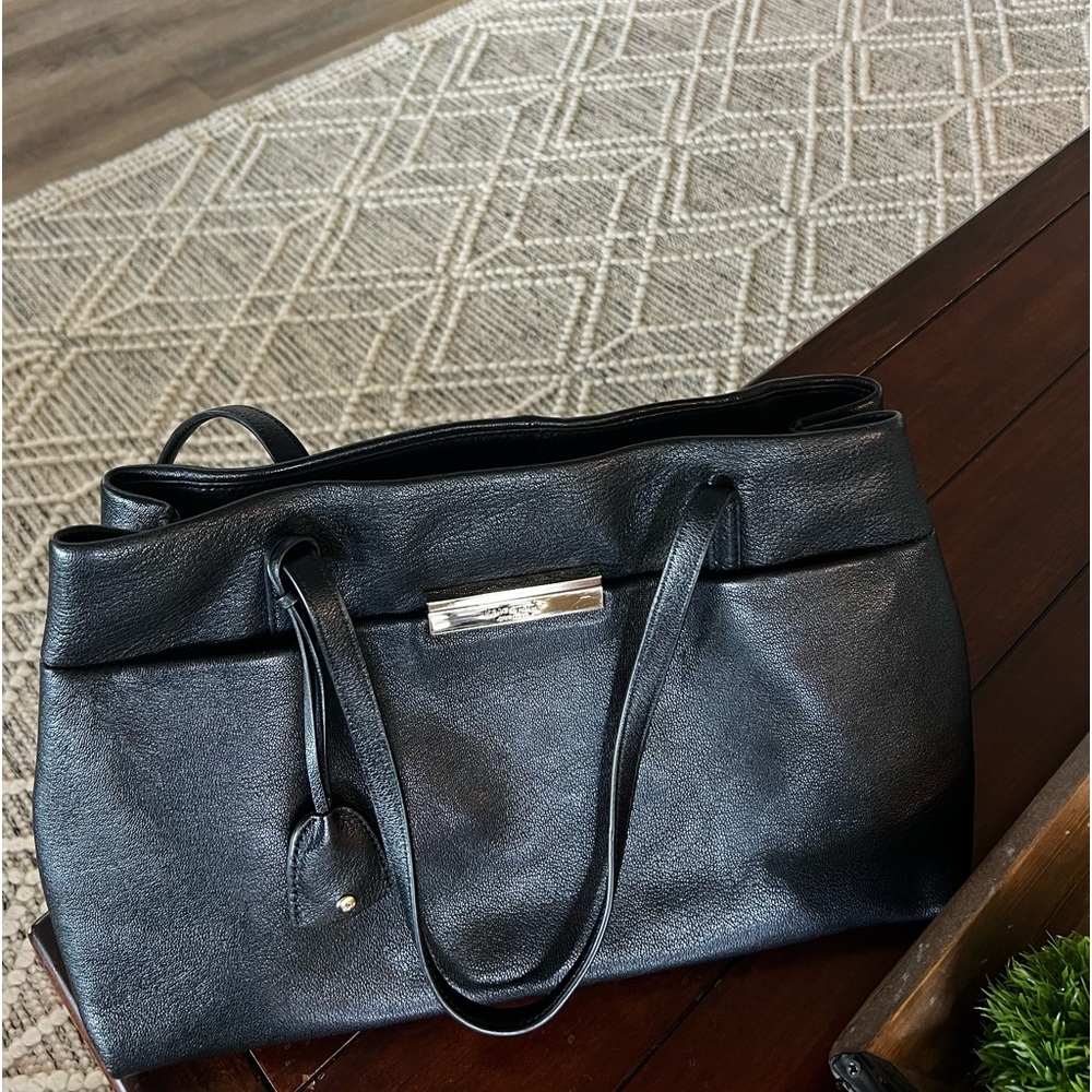Kate Spade black pebbled leather handbag great used condition w/gold bar accent